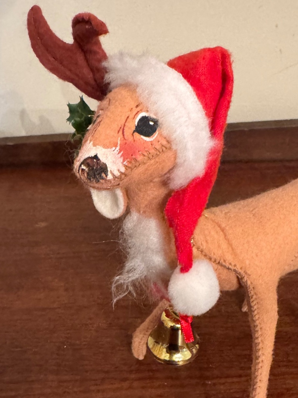 Vintage 1995 Annalee Mobilitee Christmas Reindeer wearing a Santa Hat